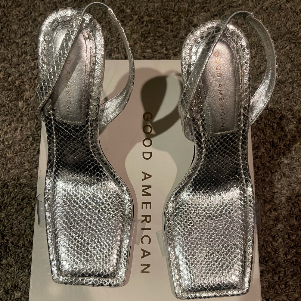 Good American Clear Silver Snake Sandals